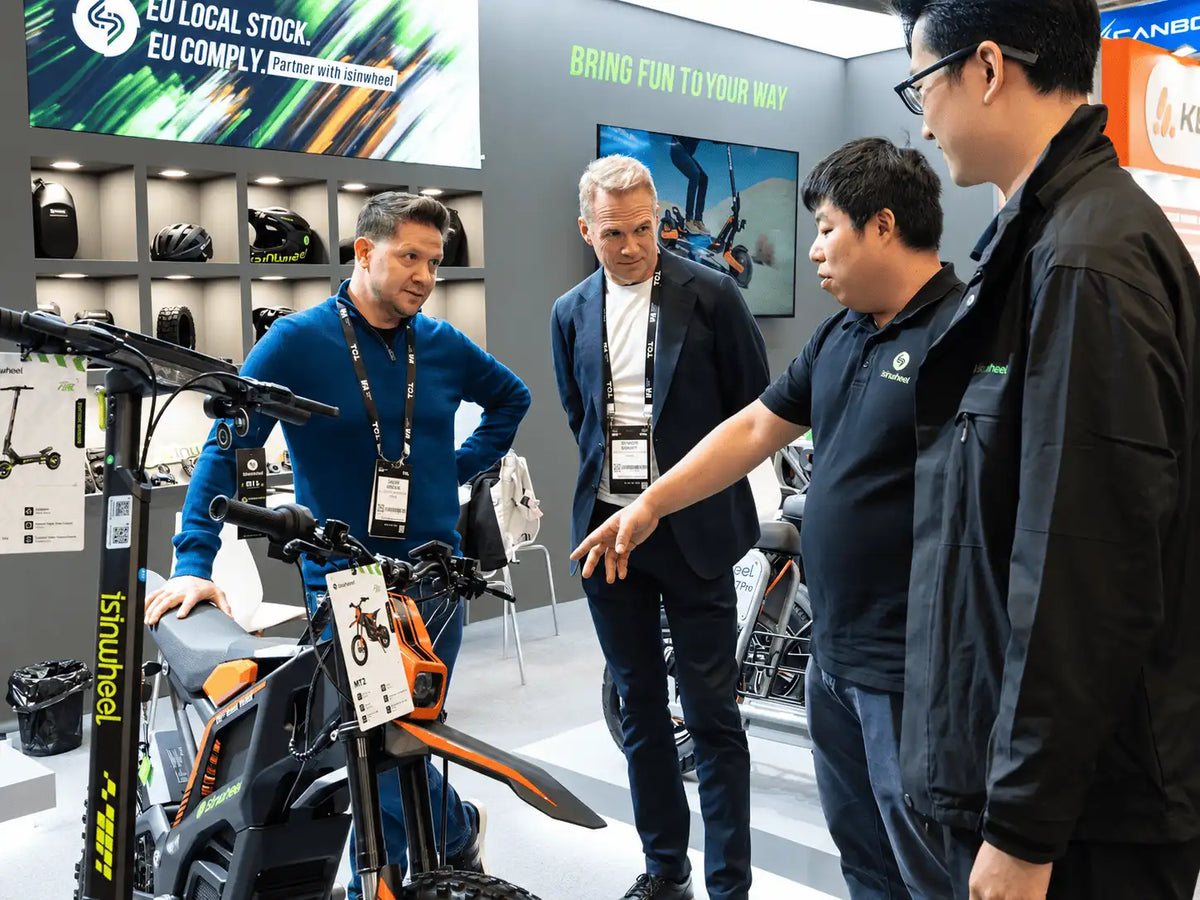 isinwheel team speaking with visitors at IFA Berlin 2026